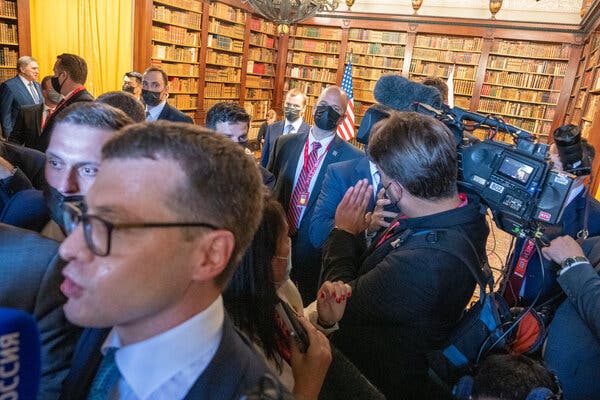 Chaotic scenes are not uncommon when reporters from multiple countries angle for the best spot to view a world leader, often in cramped spaces.
