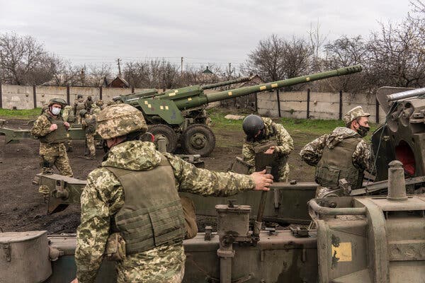 Soldiers working with artillery at a base where larger weaponry is stored in Khlibodarivka, Ukraine, in April.